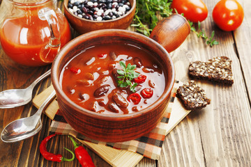 Chili soup with red beans and greens