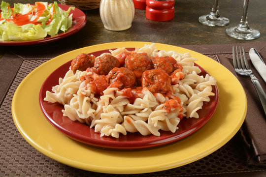 Meatballs and marinara sauce on gluten free pasta