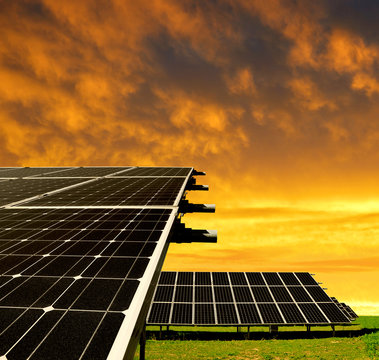 Solar energy panels in the setting sun