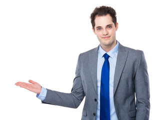 Businessman with open hand palm