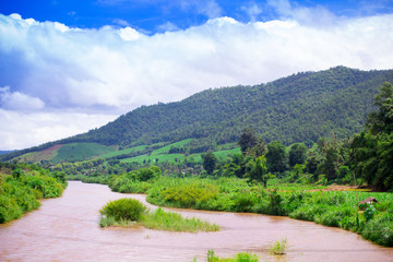 Fototapeta na wymiar Natural scene of river and mountain in Chiangmai, Thailand