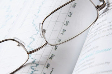 Glasses on an open book