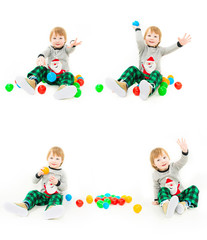 happy boy playing with colorful balls on a white background