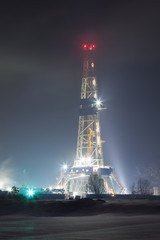 Drilling tower in the South Polish seen at night