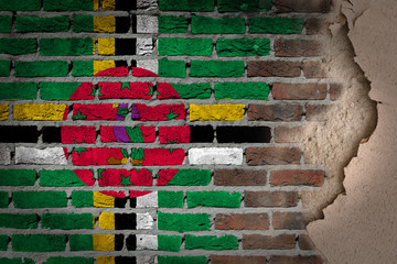 Dark brick wall with plaster - Dominica