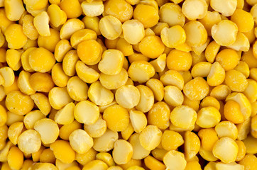 Macro closeup background texture of yellow chana split peas