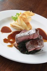 plated venison steak meal