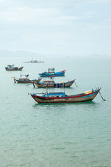 Naklejka na ściany i meble Old fisghing boat in Vietnam