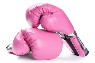 Pair of pink boxing gloves isolated on white