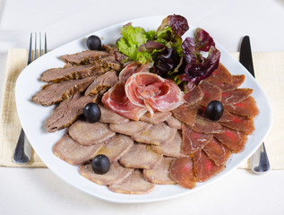 Gourmet cold meat platter on a buffet