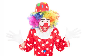 Happy male clown gesturing with hands