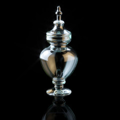 Vintage glassware on black background (conceptual picture)