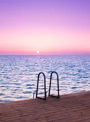 Wall murals Candy pink Pier over Sunset Waters