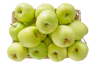 Basket of Golden Delicious apples, on white.