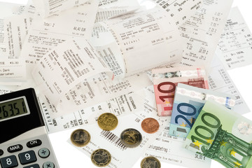 Taschenrechner, Kassenbons, Geldscheine