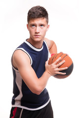 Basketball player with the ball on white background