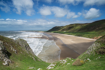 Beautiful Summer landscape of Rhosilli Bay beach Gower peninsula