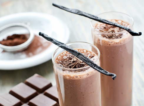 Chocolate smoothie in glasses with vanilla beans