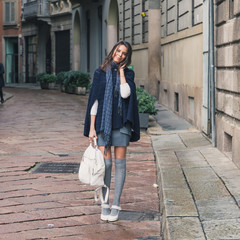 Beautiful girl posing in the city streets