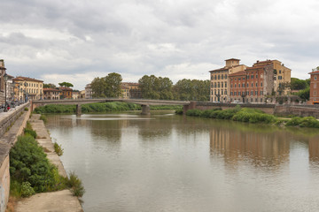 Fototapeta na wymiar Arno River and waterfront buildings, Pisa