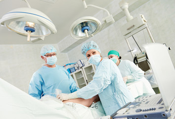 surgeons team at surgery operation