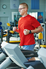 cardio-fitness jogging at treadmill