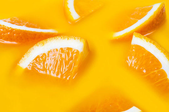 Many fresh a slice of orange close-up