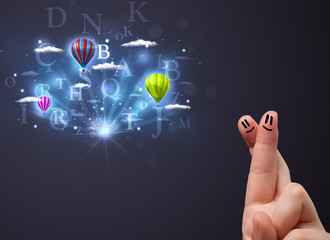 Happy smiley fingers looking at hot air balloons in the cloudy s