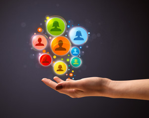 Fototapeta premium Social network icons in the hand of a woman