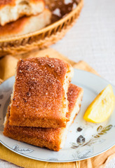 lemon cinnamon rolls on a wooden background