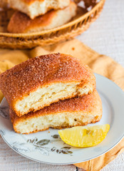 lemon cinnamon buns on a white plate,breakfast