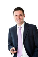 Handsome young business man standing with smart phone.