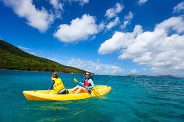 Fototapeta na wymiar Family kayaking at tropical ocean