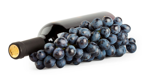 Lying a bottle wine and bunch of grapes © alexlukin