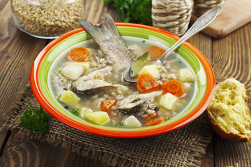 Homemade soup of river fish in the bowl