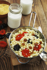 Millet porridge with dried fruit