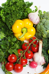 decorative pattern of fresh vegetables on white background