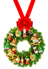 christmas wreath decorated with ornaments and red ribbon bow