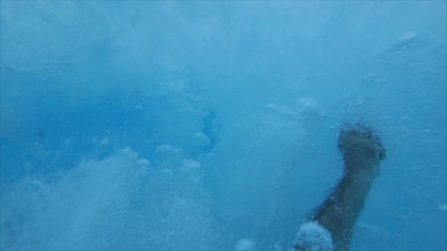 Man underwater after the jump