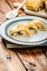 Salmon baked in puff pastry