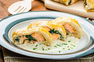 Salmon baked in puff pastry