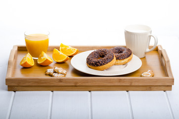 Breakfast tray donut orange and milk