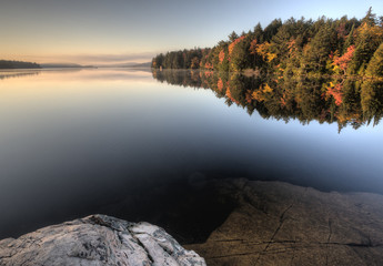 Lake in Autumn sunrise reflection