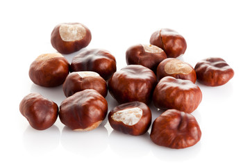 Chestnut on white background. ripe chestnuts