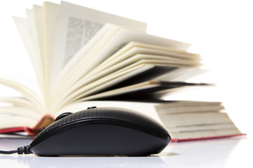 Computer mouse and book