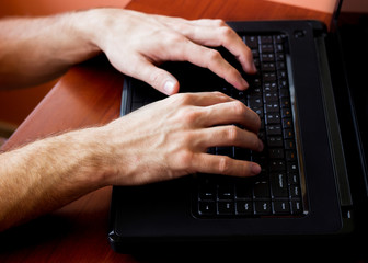 Man using laptop computer