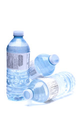 Bottled water close up shot isolated on the white background, sh