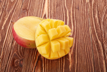 Mango fruit on wood