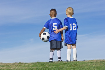 Fototapeta premium Youth Soccer Players standing together Rear View