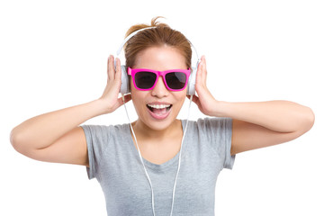 Woman with headphone and sunglasses